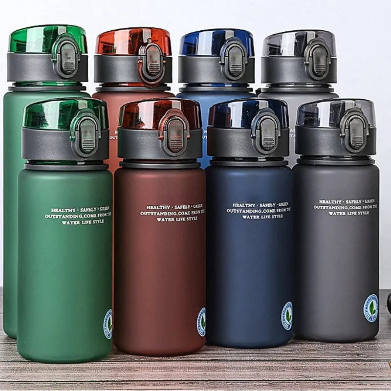 Sports water bottle with carrying strap