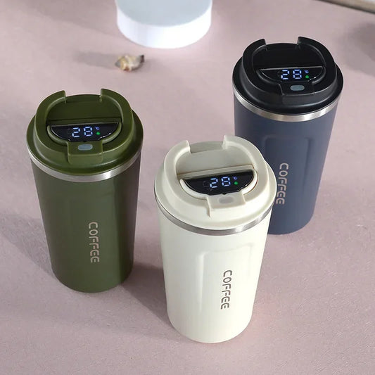 Stainless steel insulated travel mug with temperature display