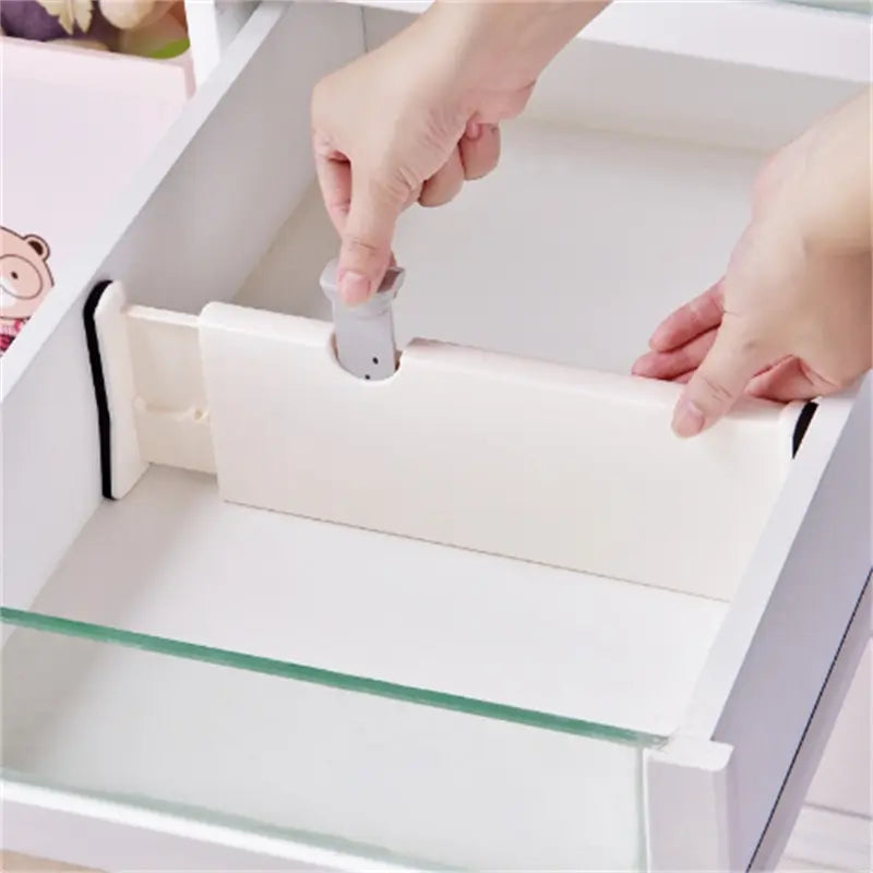 Adjustable white drawer divider for kitchen storage