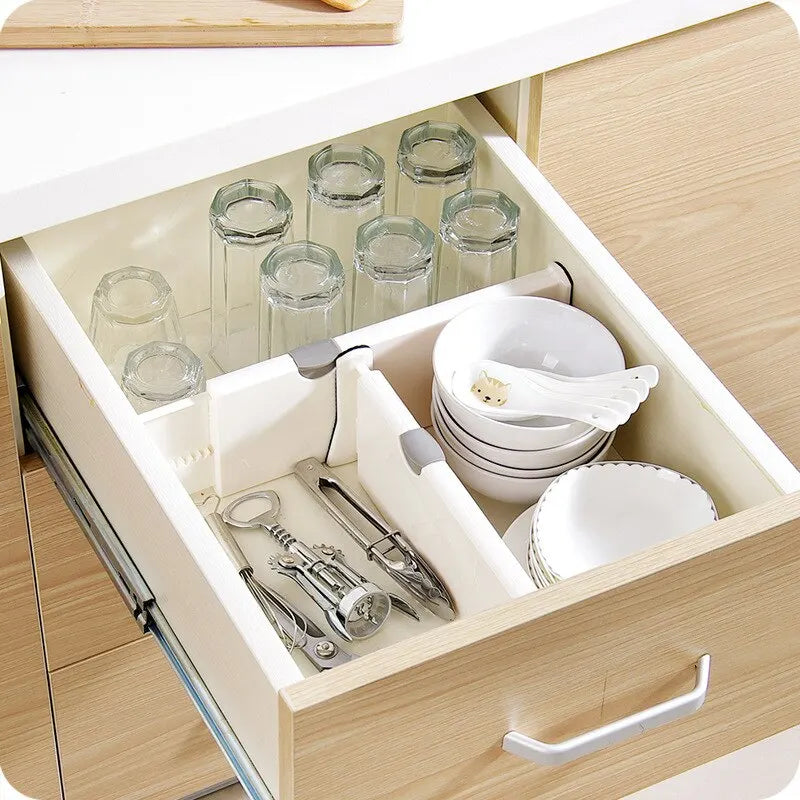 Expandable drawer divider creating organized sections