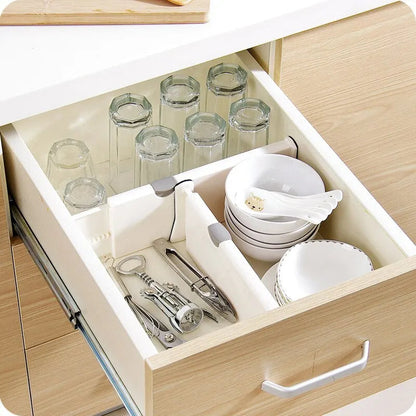Expandable drawer divider creating organized sections